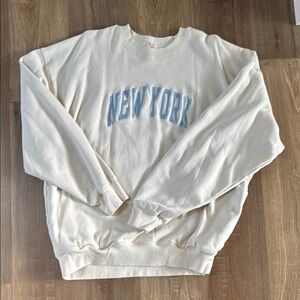 Brandy Melville “New York” cream crewneck